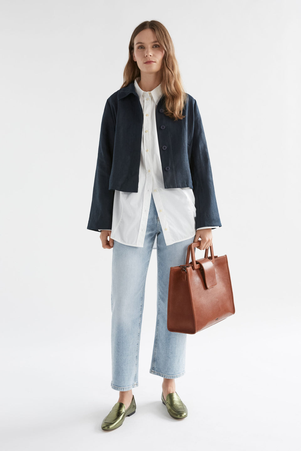 Clift Metallic Silver Leather Flat Loafer Angled Front model | OLIVE