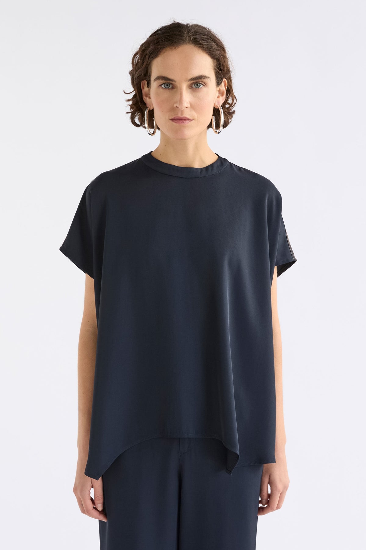 Hullu Relaxed Short Sleeve High Neck Top with Handkerchief Hem Model Front | NAVY