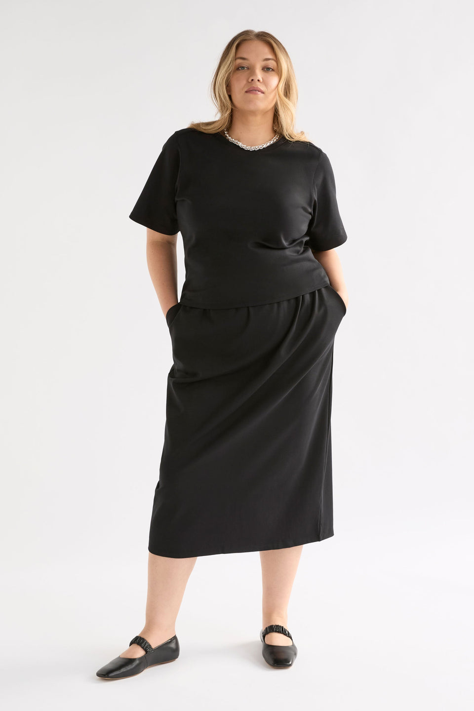 Mana Skirt on Model styled with tee | BLACK