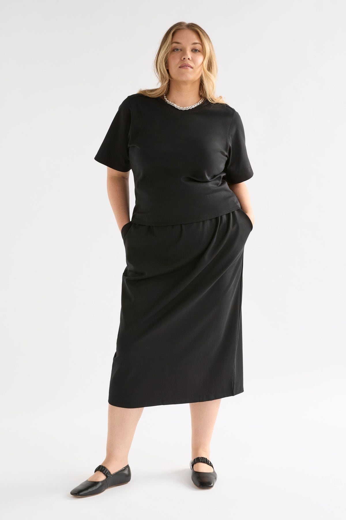 Mana Skirt on Model styled with tee | BLACK