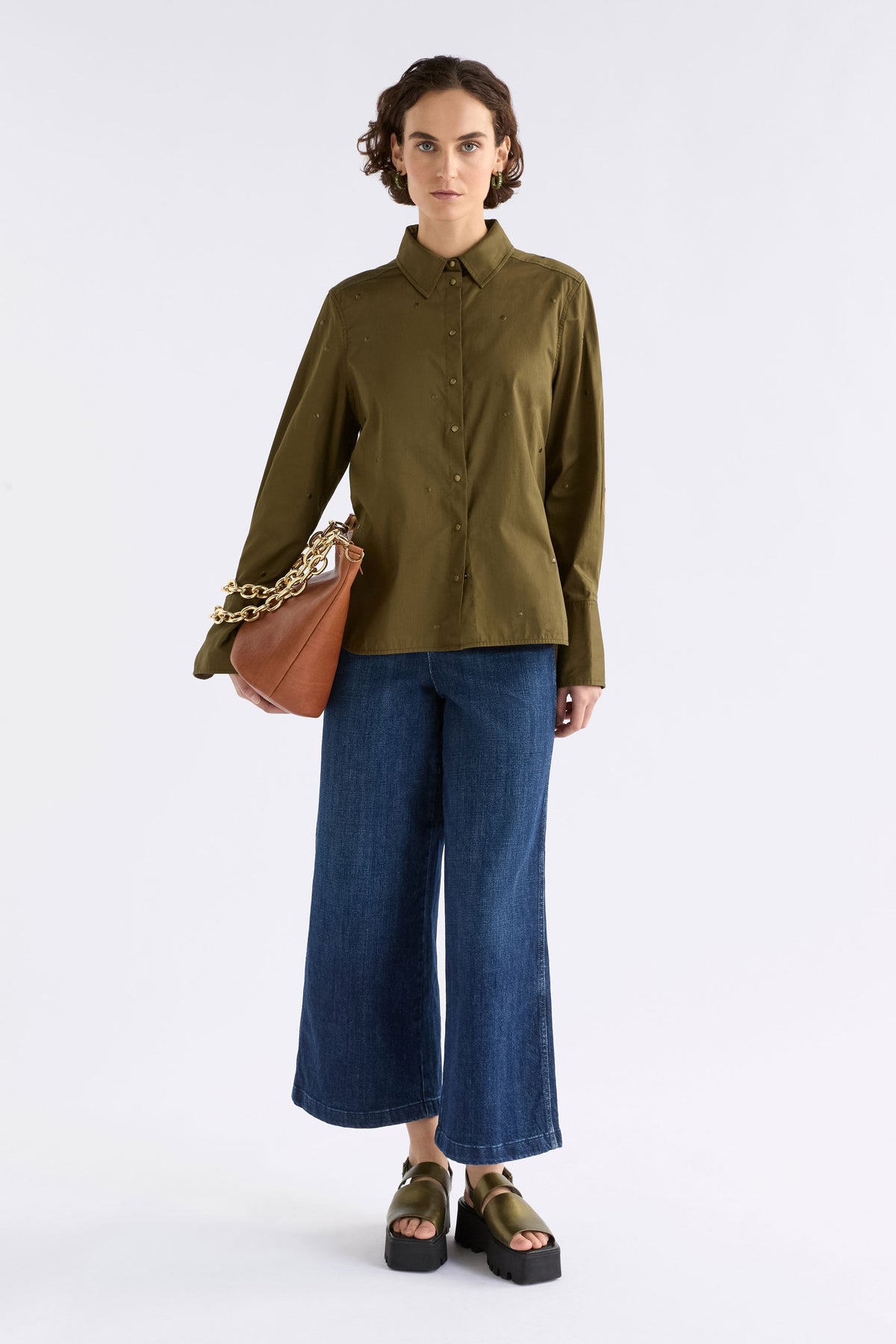Stuud Organic Cotton Long Sleeve Shirt with all over stud detail Model Front full Body with bag | OLIVE