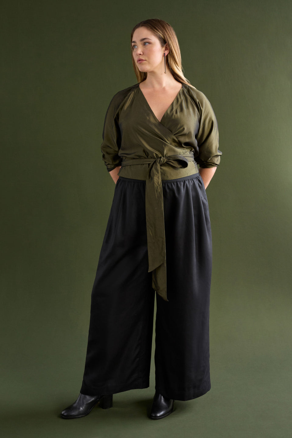 Medjal Metallic Wrap Long Sleeve Top Model Chanel Front Full Body | GOLD BLACK