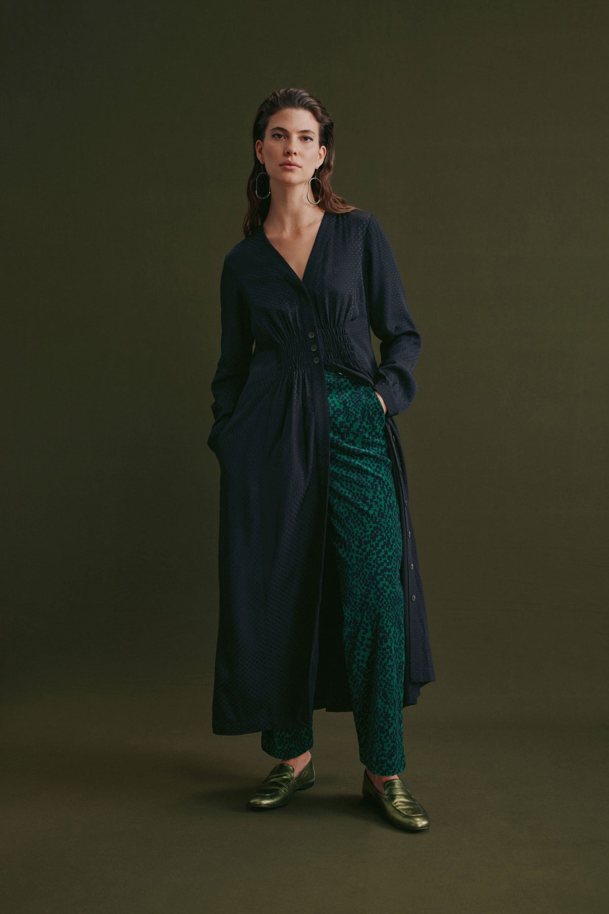Atles High Waisted Tapered Leg Dark Green Pattern Cut Cord Pant Model Front Campaign with Dress | GREEN SINDA PRINT