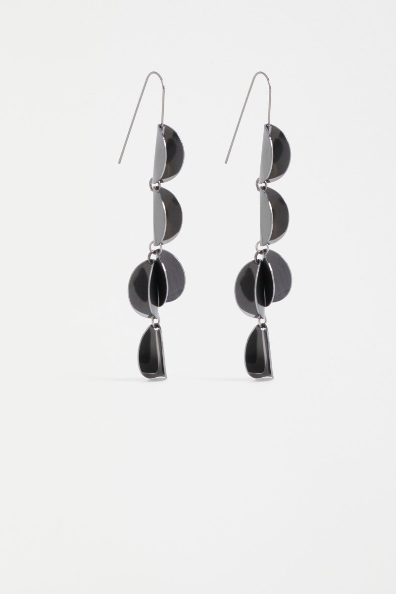 The Fossen Drop Earring features folded metal discs in a vertical row with a brushed finish ELK | GUNMETAL