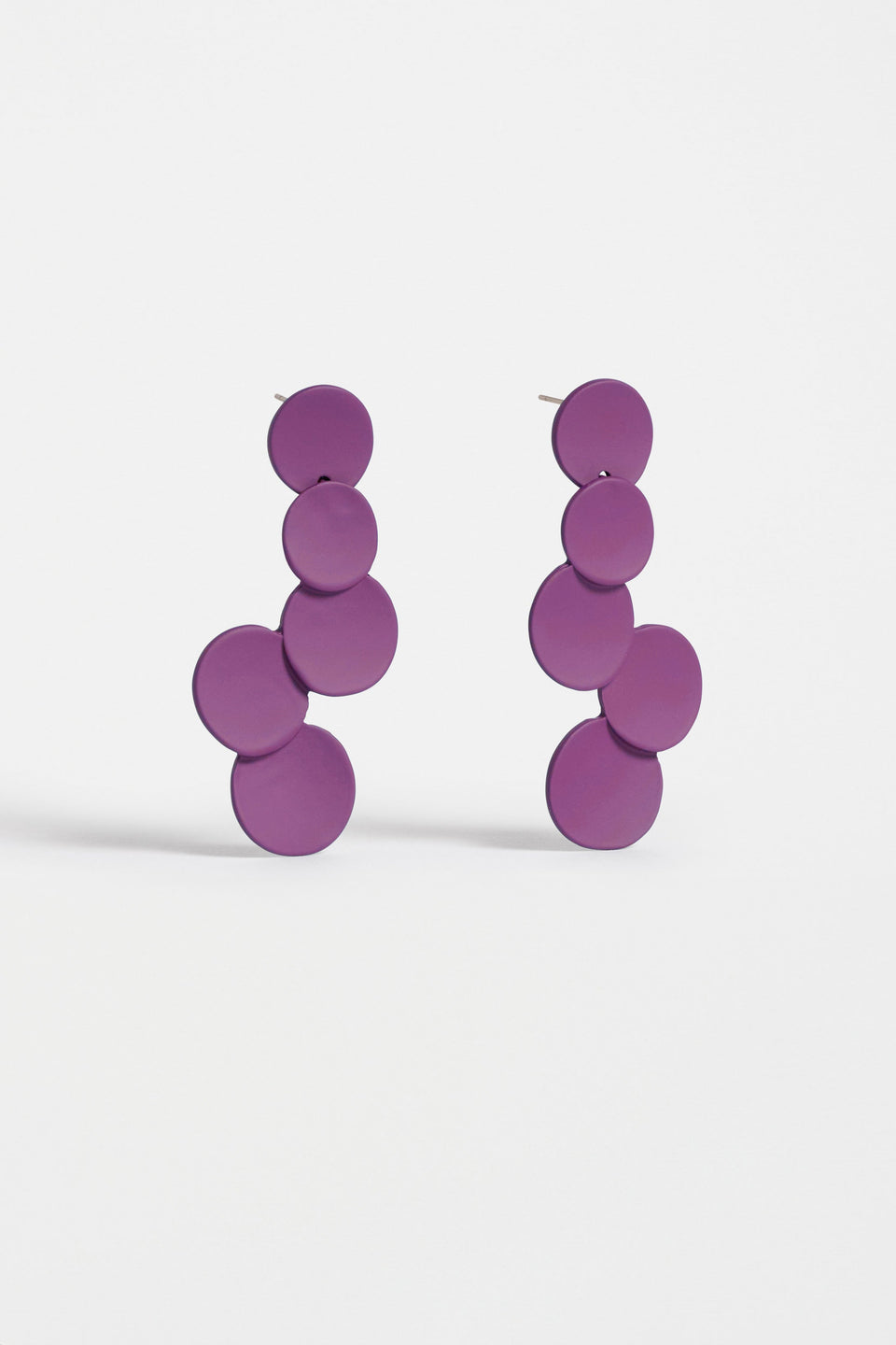 The Tallke Drop Earring features overlapping sculptural circles in an elongated form with a matte rubberised finish for playful impact ELK | MULBERRY