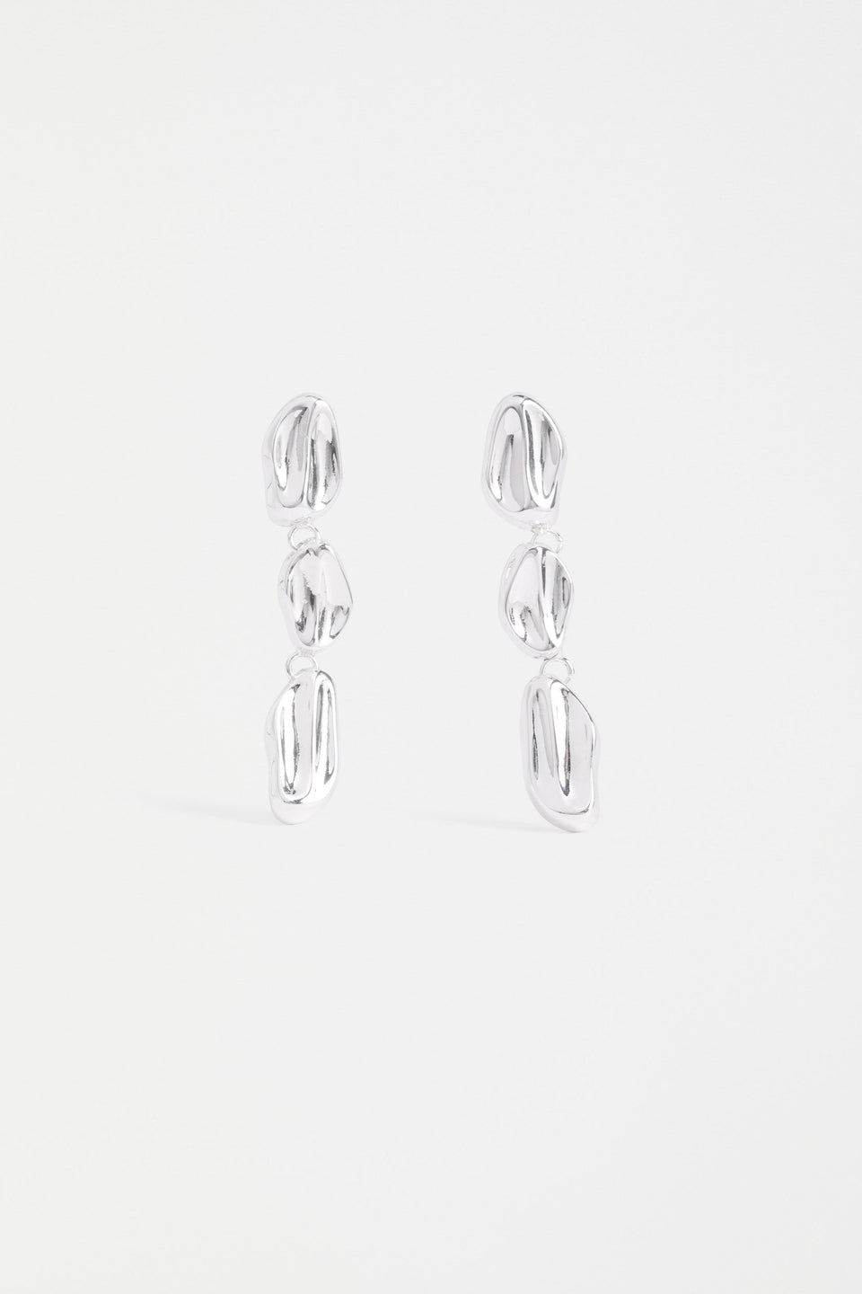 The Delaa Drop Earring features three sculptural rounded shapes linked for soft, organic movement ELK | SILVER