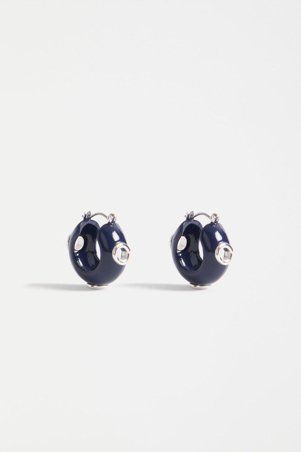The Jans Hoop Earring features a chunky mini hoop silhouette with glossy enamel and metallic rivet detailing for a bold, playful finish | BRIGHT NAVY