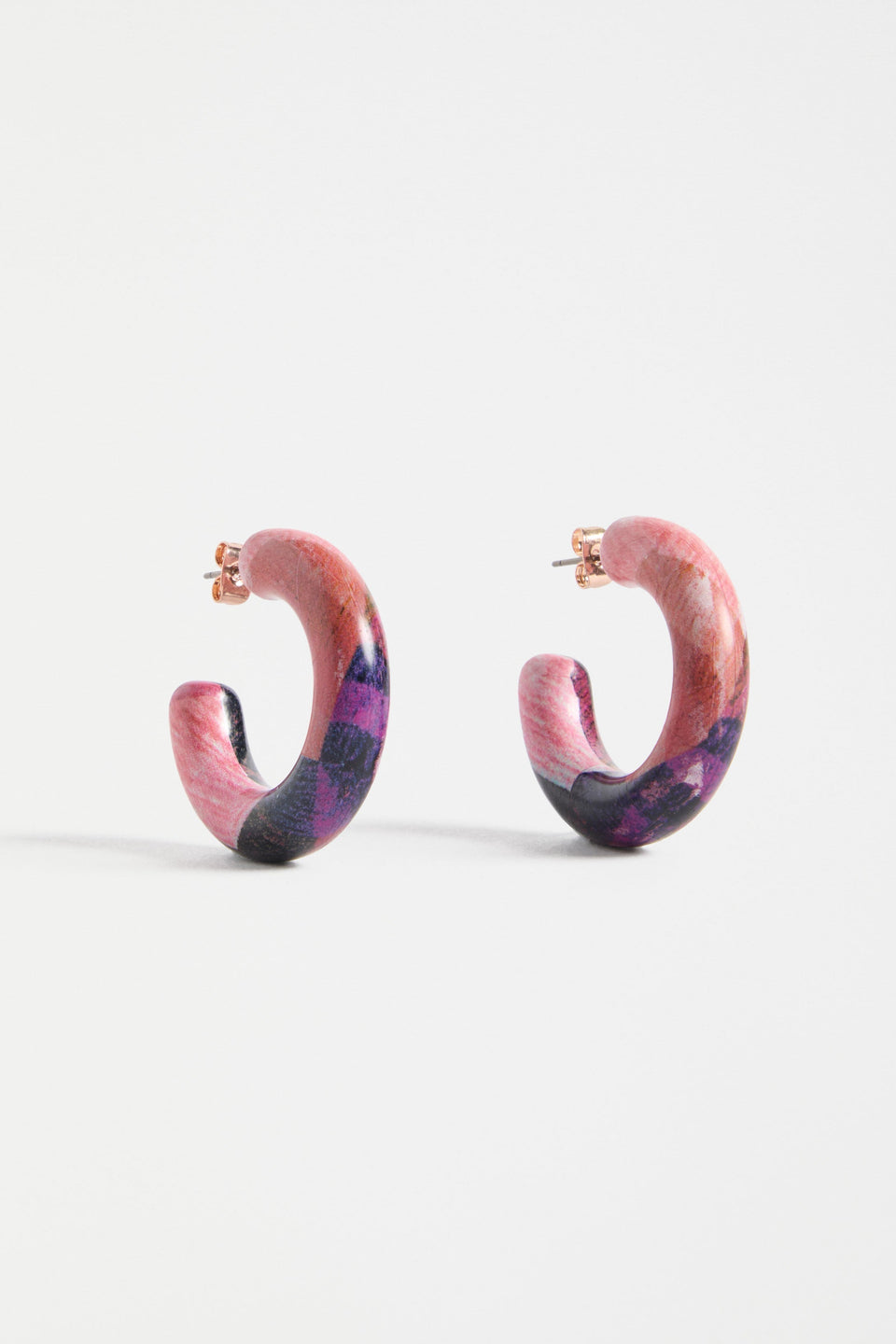 The Resso Hoop Earring features a mid-sized open resin hoop with a contemporary silhouette and playful all-over printed design | FUSCHIA KOMI PRINT