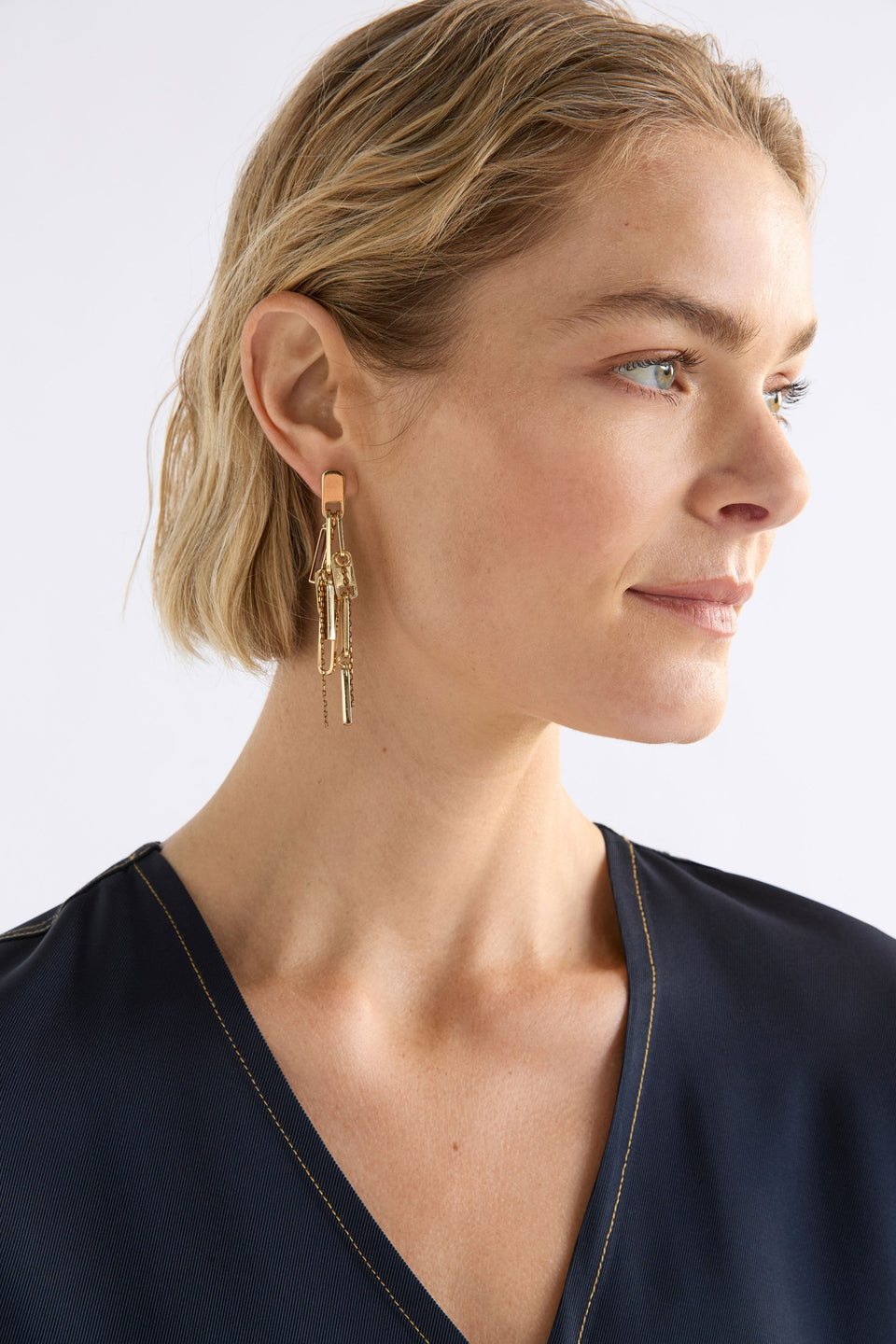 Rymi Multi Chain Statement Drop Earring Model | GOLD