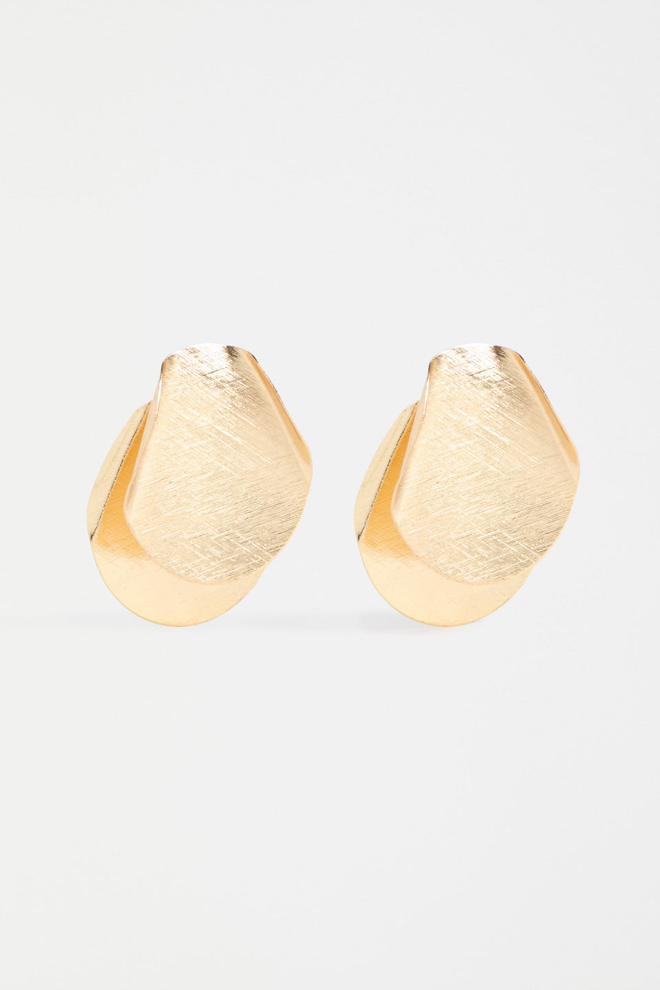 The Villt Earring features two overlapping petal-like forms crafted from fine, shiny metal for a lightweight sculptural statement ELK | GOLD