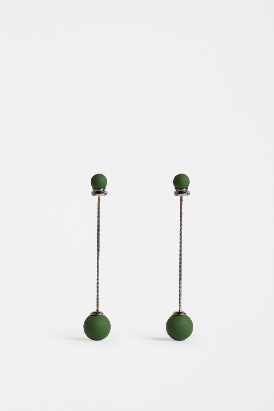 The Sarra Drop Earring features a slender chain with a small bead at the ear and a larger bead drop, creating elegant, lightweight movement | GUNMETAL