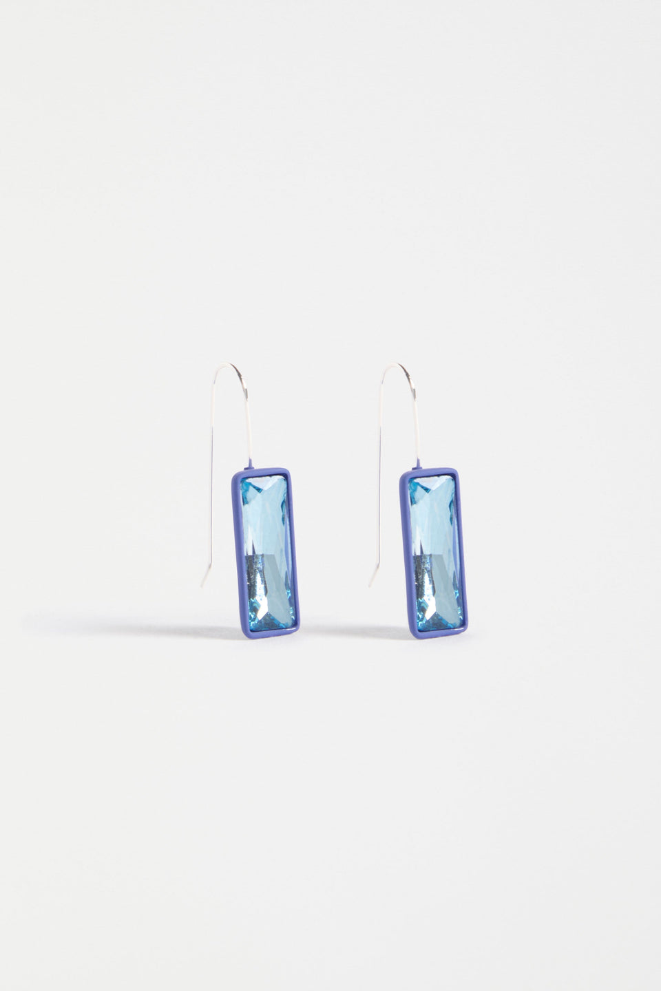 The Jule Small Hook Earring features a single glass stone with tonal rubberised casing and a simple hook, offering lightweight refinement | BLUE MIST