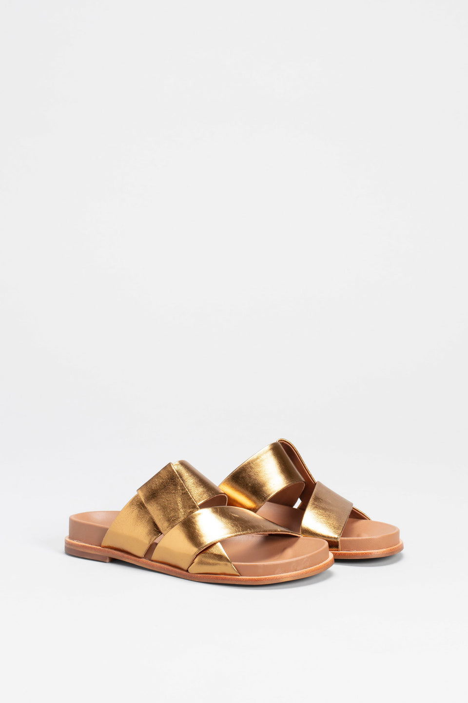 Uma Metallic Leather Cross Strap Slide Angled Front | GOLD