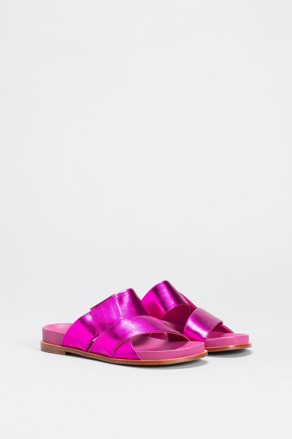 Uma Metallic Leather Cross Strap Slide Angled Front | FUCHSIA