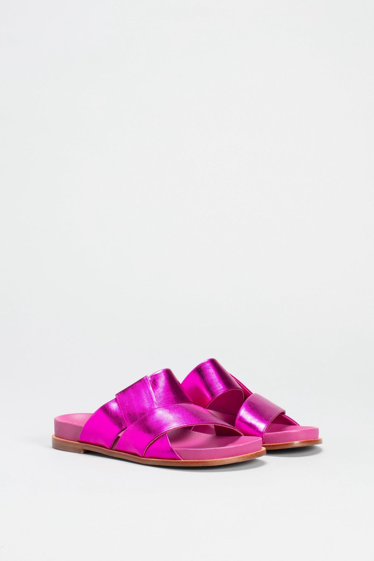 Uma Metallic Leather Cross Strap Slide Angled Front | FUCHSIA