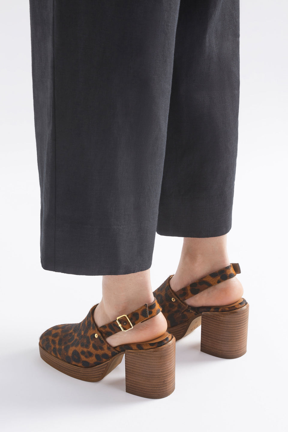 Stockholm Chunky Heel Slip on Clog with Back Strap in Animal Print Angled Back Model | ANIMAL PRINT