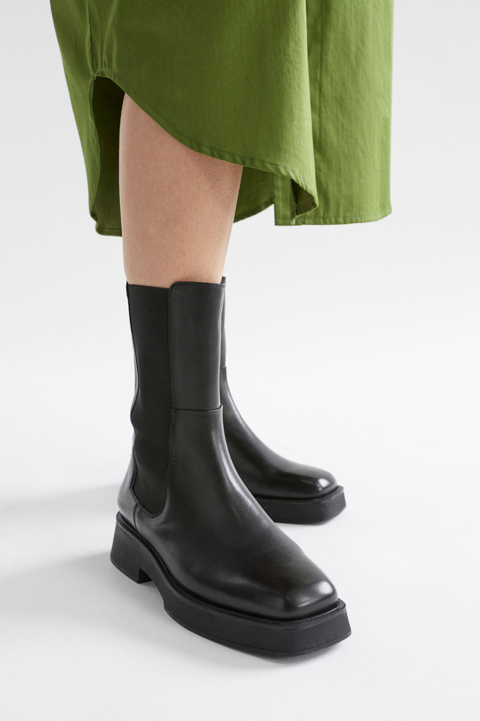 Irsa Square Toe Mid length Leather Chelsea Boot Model Angled Front | BLACK