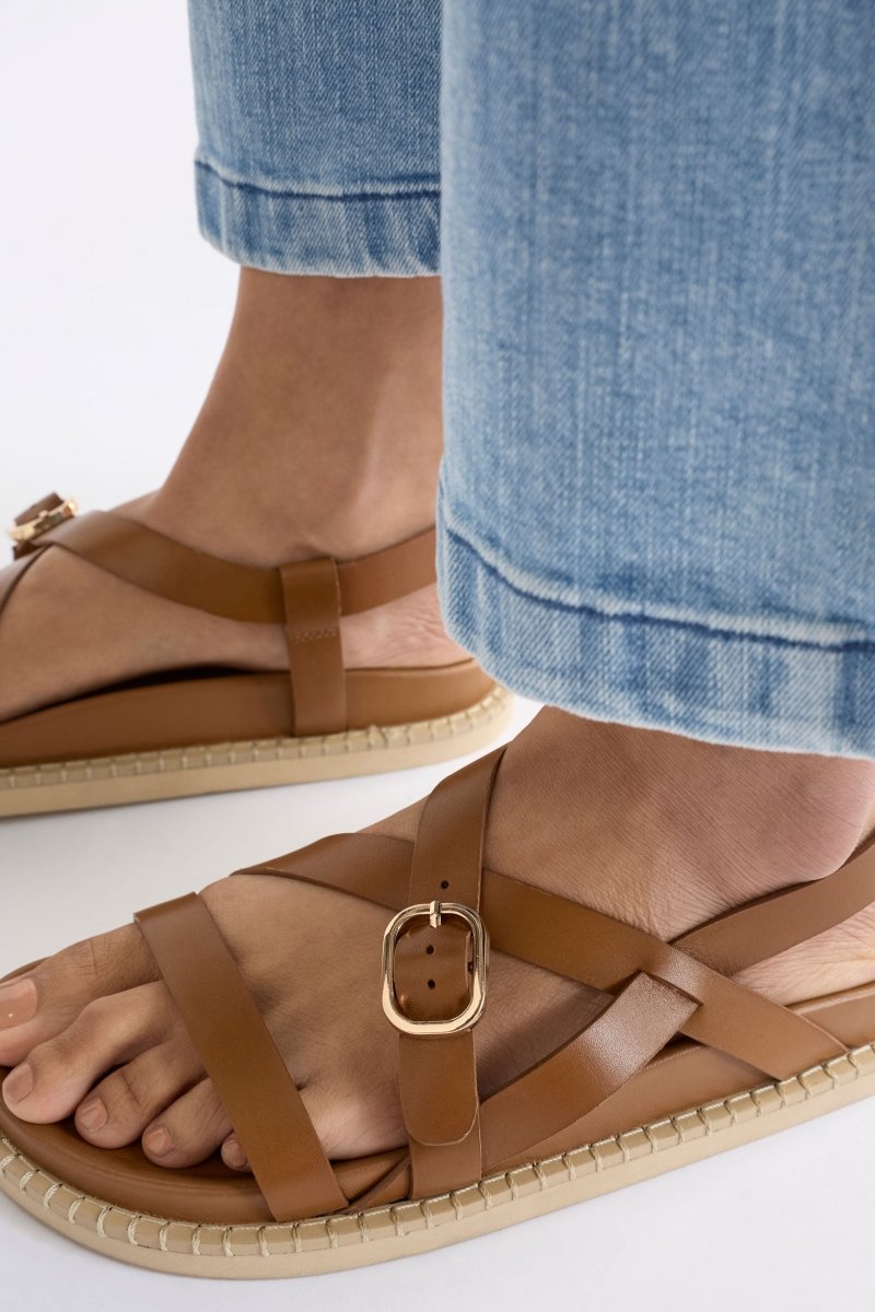 The Kilsa Sandal features minimal tan leather straps, moulded footbed and EVA sole in a handcrafted design ELK | TAN
