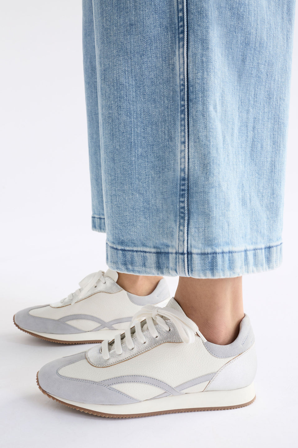Steni Trainer Shoe on model styled with denim | LIGHT GREY