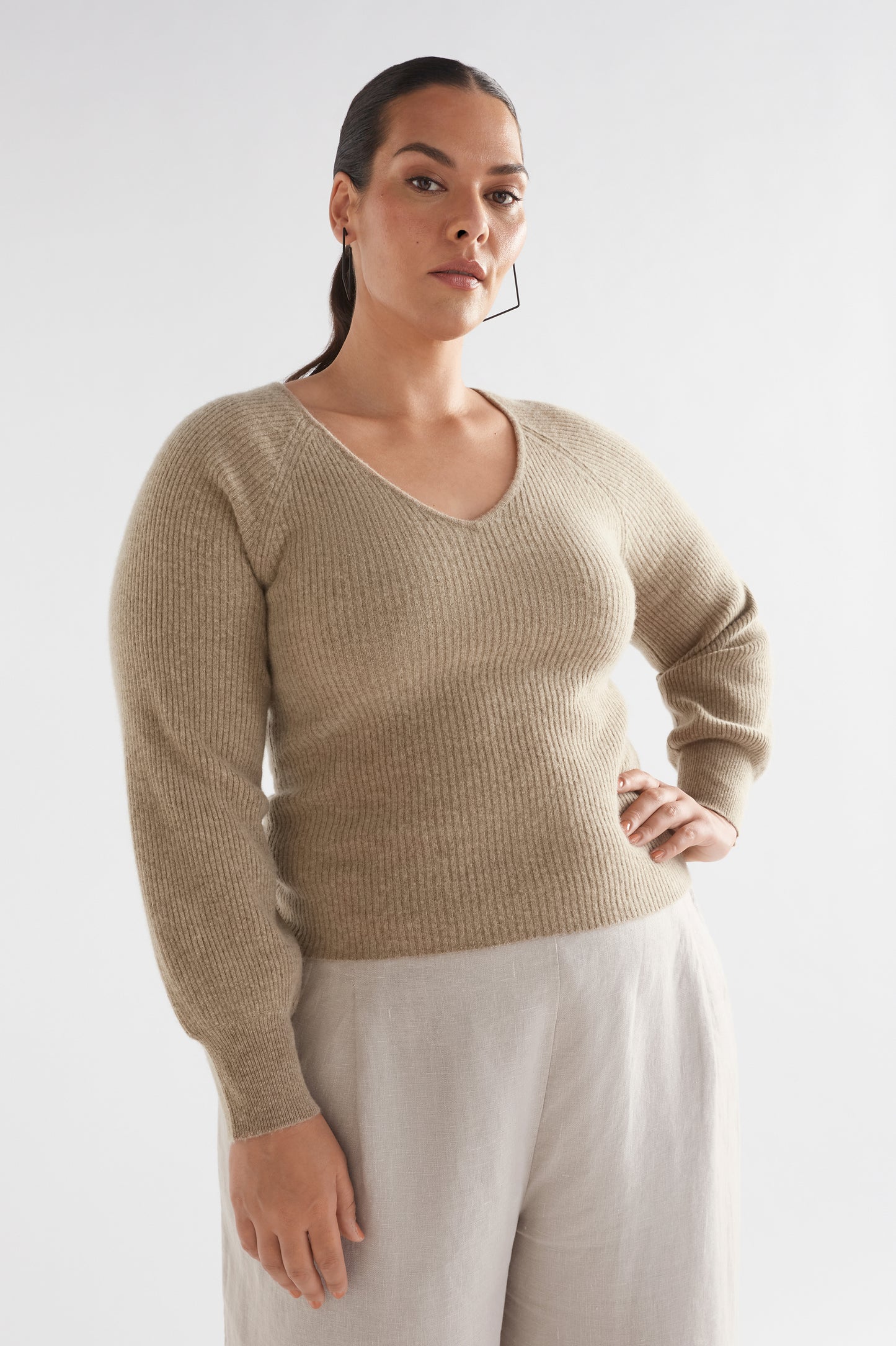 Lysa V-Neck Puff Sleeve Rib Wool Knit Sweater Model Front curve | SAND