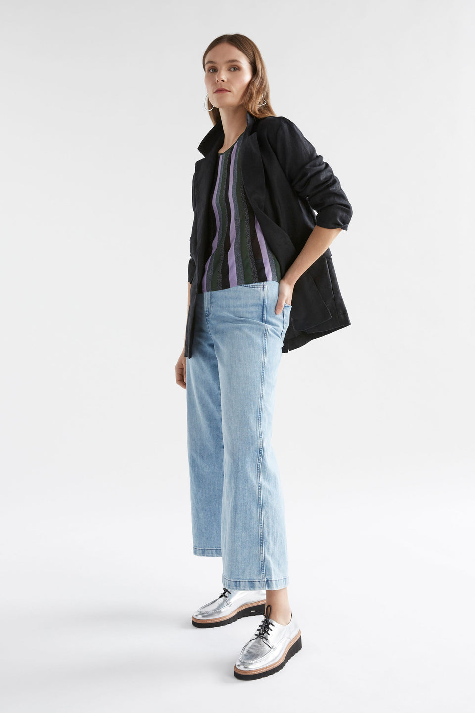 Rik Lurex Metallic Stripe A-line Hem Short Sleeve Knit Top Model Side with Jacket | MULTI METALLIC STRIPE