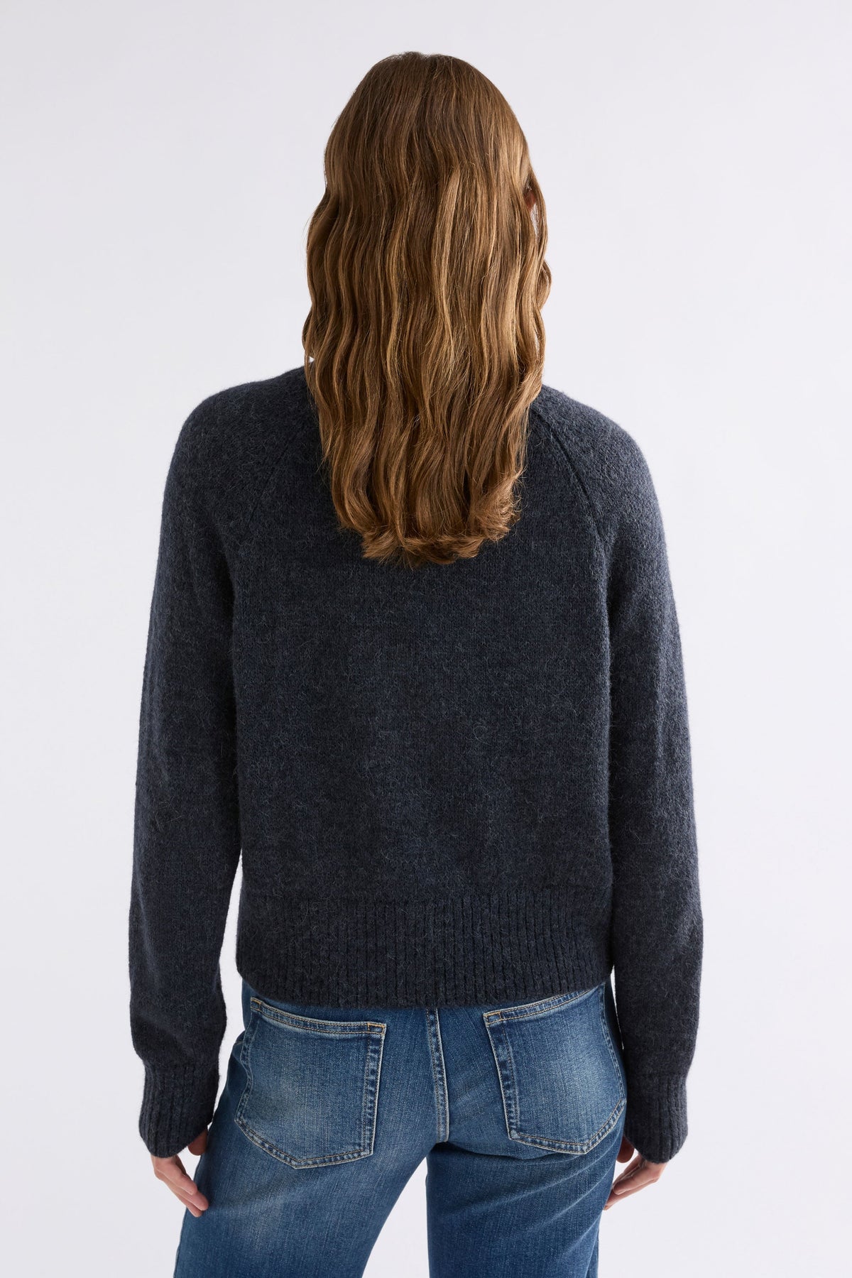 Enka Neat Fit Funnel Neck Sweater Model Back | CARBON