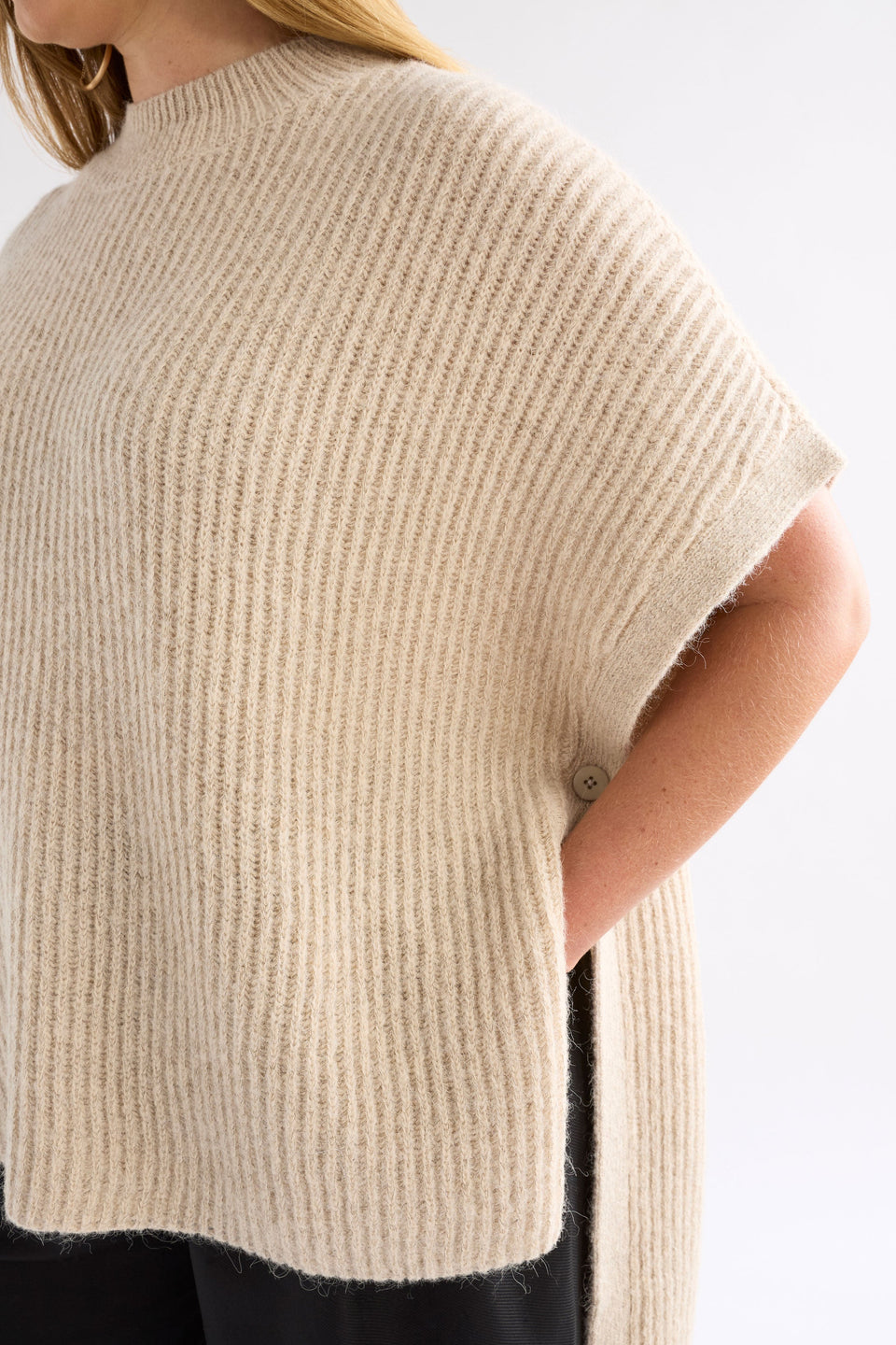 Kaanto Boxy Funnel Neck Rib Stitch Alpaca-Merino Wool Knit Poncho Model Chanel Front detail | LATTE
