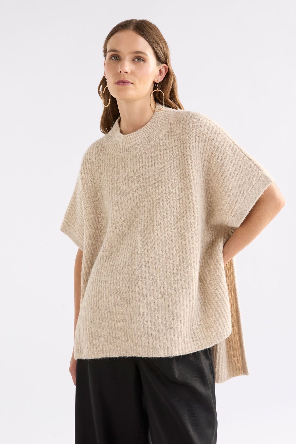 Kaanto Boxy Funnel Neck Rib Stitch Alpaca-Merino Wool Knit Poncho Model Front | LATTE