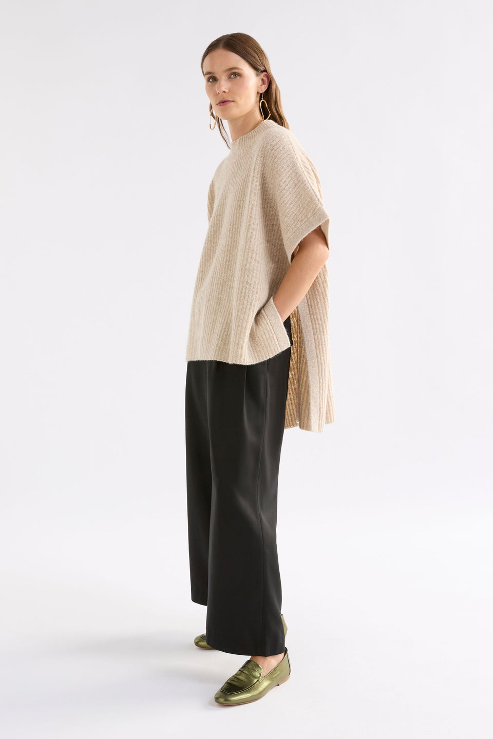 Kaanto Boxy Funnel Neck Rib Stitch Alpaca-Merino Wool Knit Poncho Model Side | LATTE