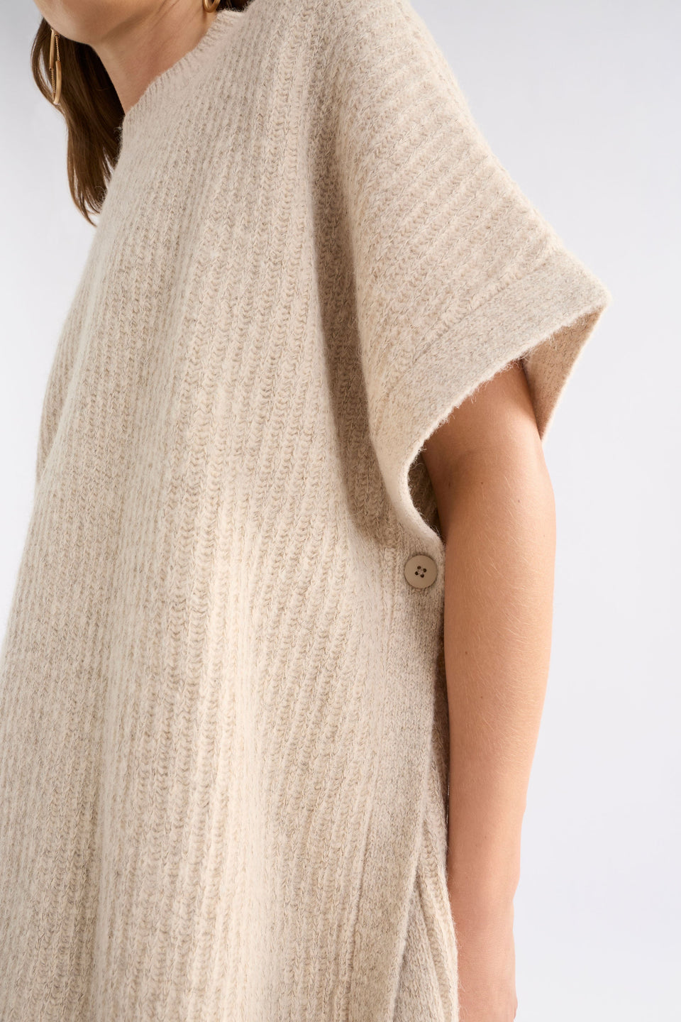 Kaanto Boxy Funnel Neck Rib Stitch Alpaca-Merino Wool Knit Poncho Model Side detail | LATTE
