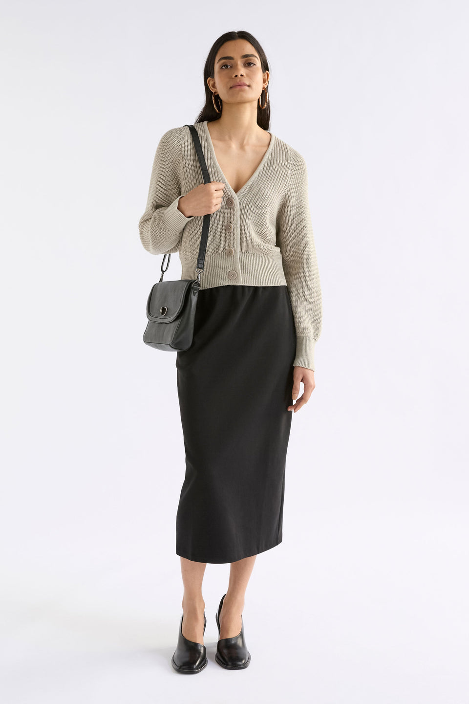 Saari Cardigan on Model styled with skirt and bag | ECRU