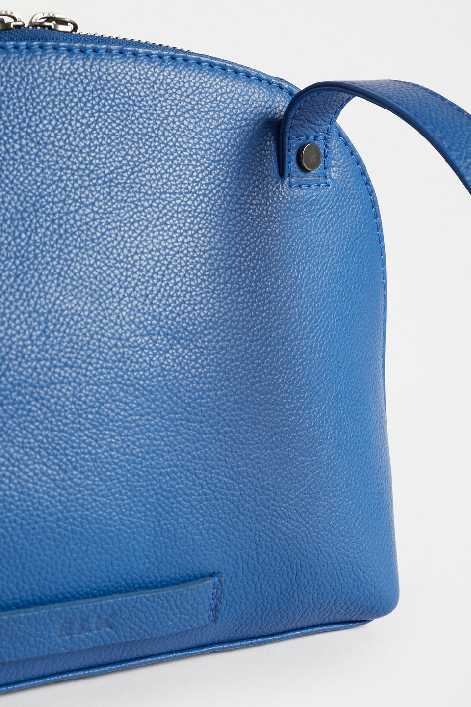 Orcas Half Moon Zip Up Small Leather Bag front detail | DEEP BLUE
