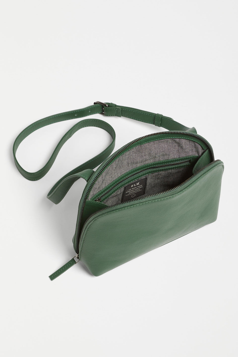 Orcas Half Moon Zip Up Small Leather Bag front internal | DARK GREEN
