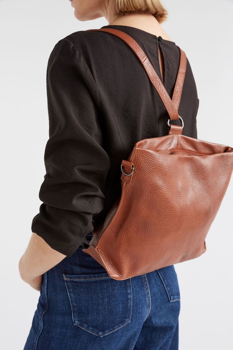 Nuoli Mini Leather Transformable Backpack to Crossbody Bag On Model Detail | TAN