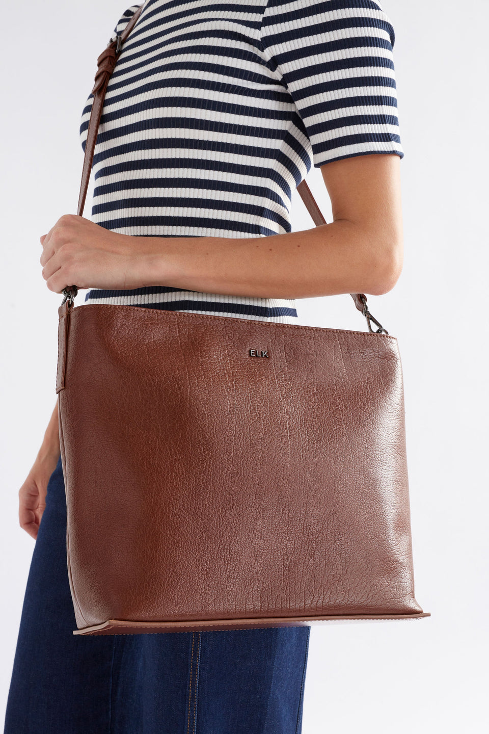 Olin Mid Sized Leather Shoulder Bag Front Model | TAN