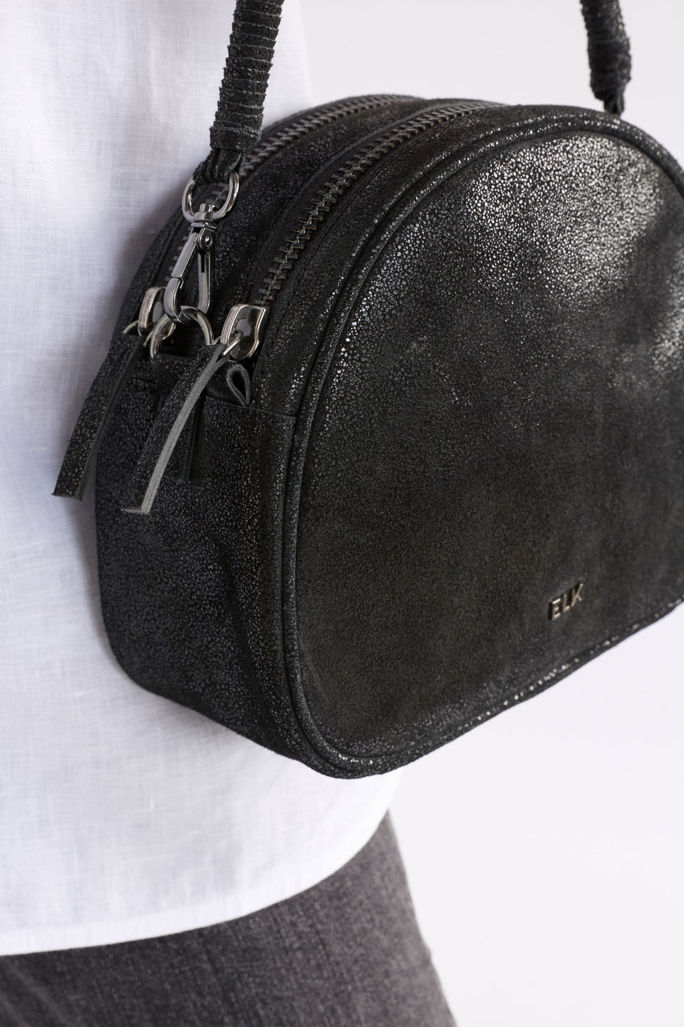 Kjeld Rounded Small Leather Crossbody Bag with Detachable handle and Strap back Model detail | BLACK SHIMMER
