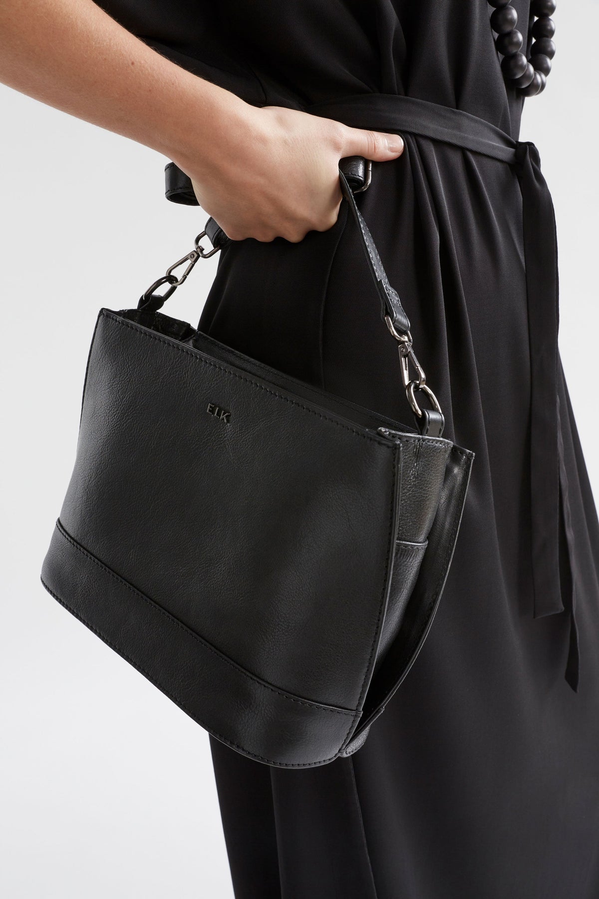 Fika Mid Sized Leather Zip up Handbag Model Detail | BLACK