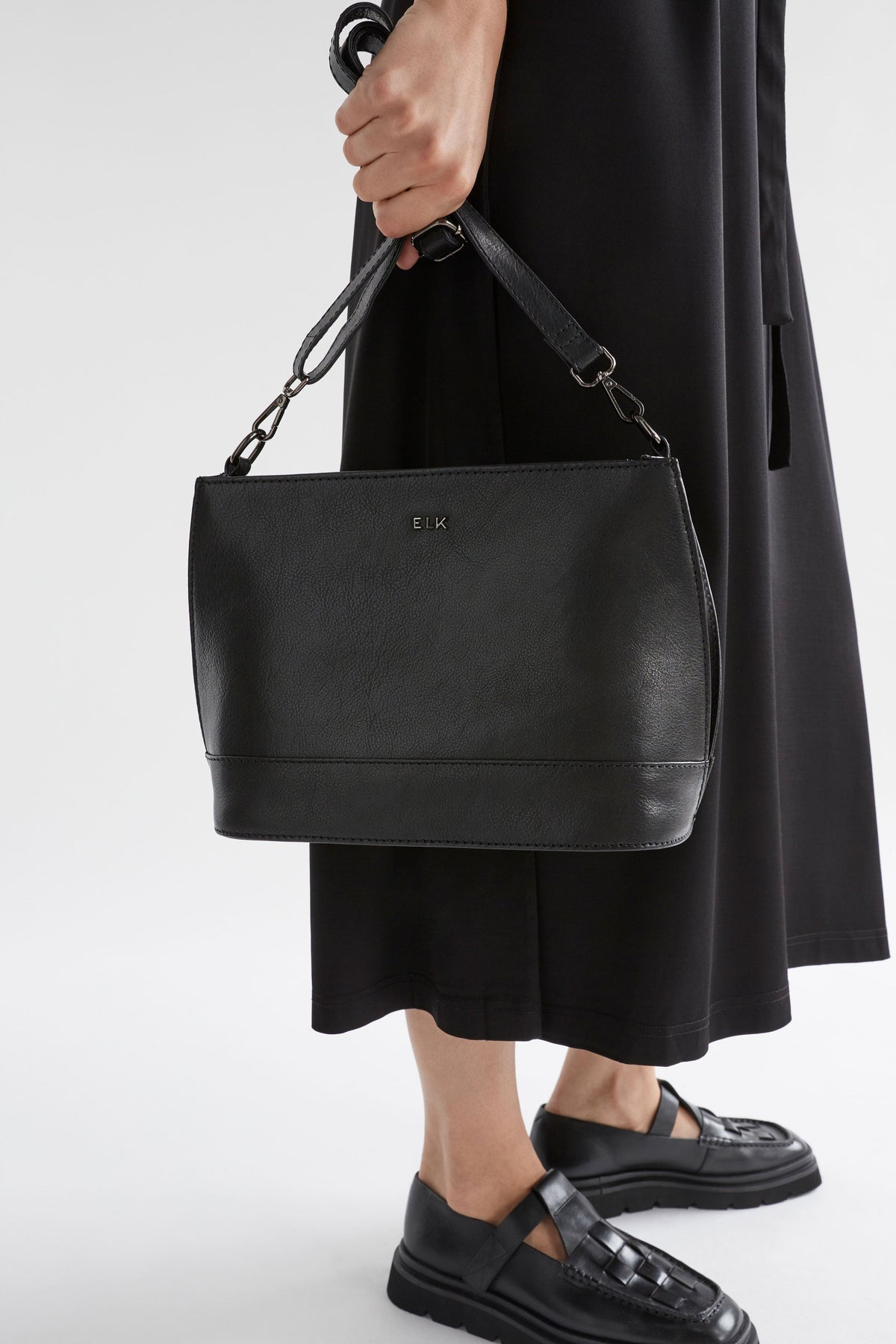 Fika Mid Sized Leather Zip up Handbag Model | BLACK