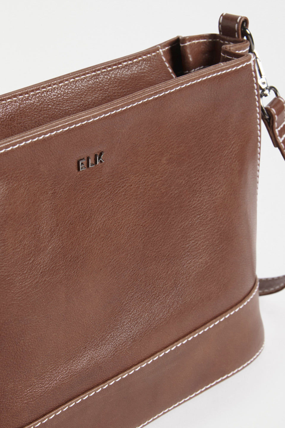 Fika Mid Sized Leather Zip up Handbag Detail | TAN