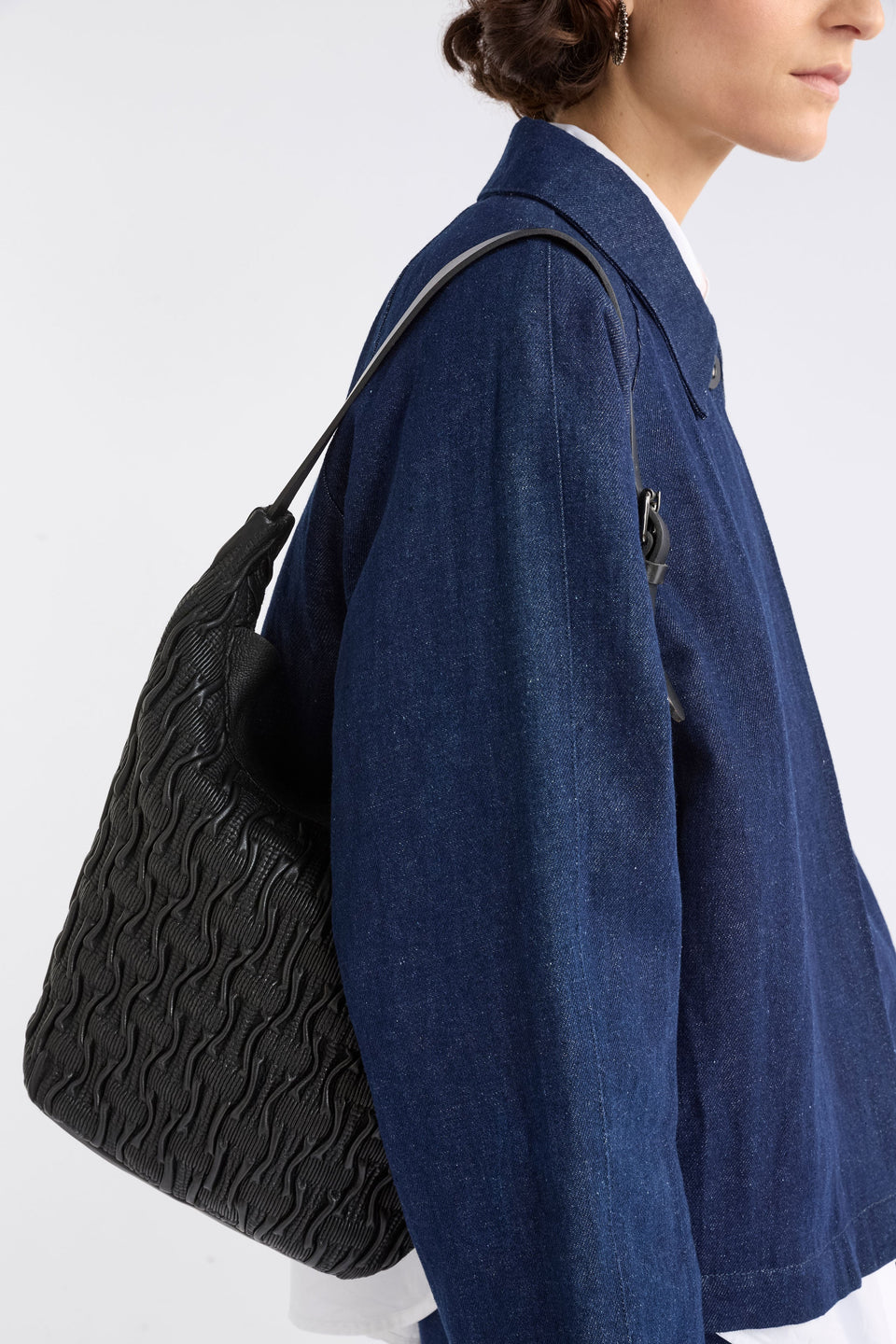 Lumme Smocked Leather Small Shoulder Bag on model 2 | BLACK