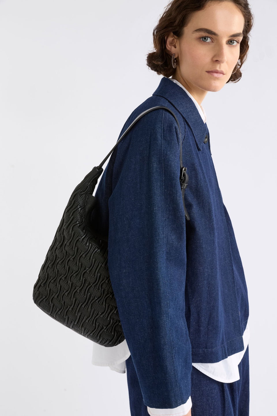 Lumme Smocked Leather Small Shoulder Bag on model | BLACK