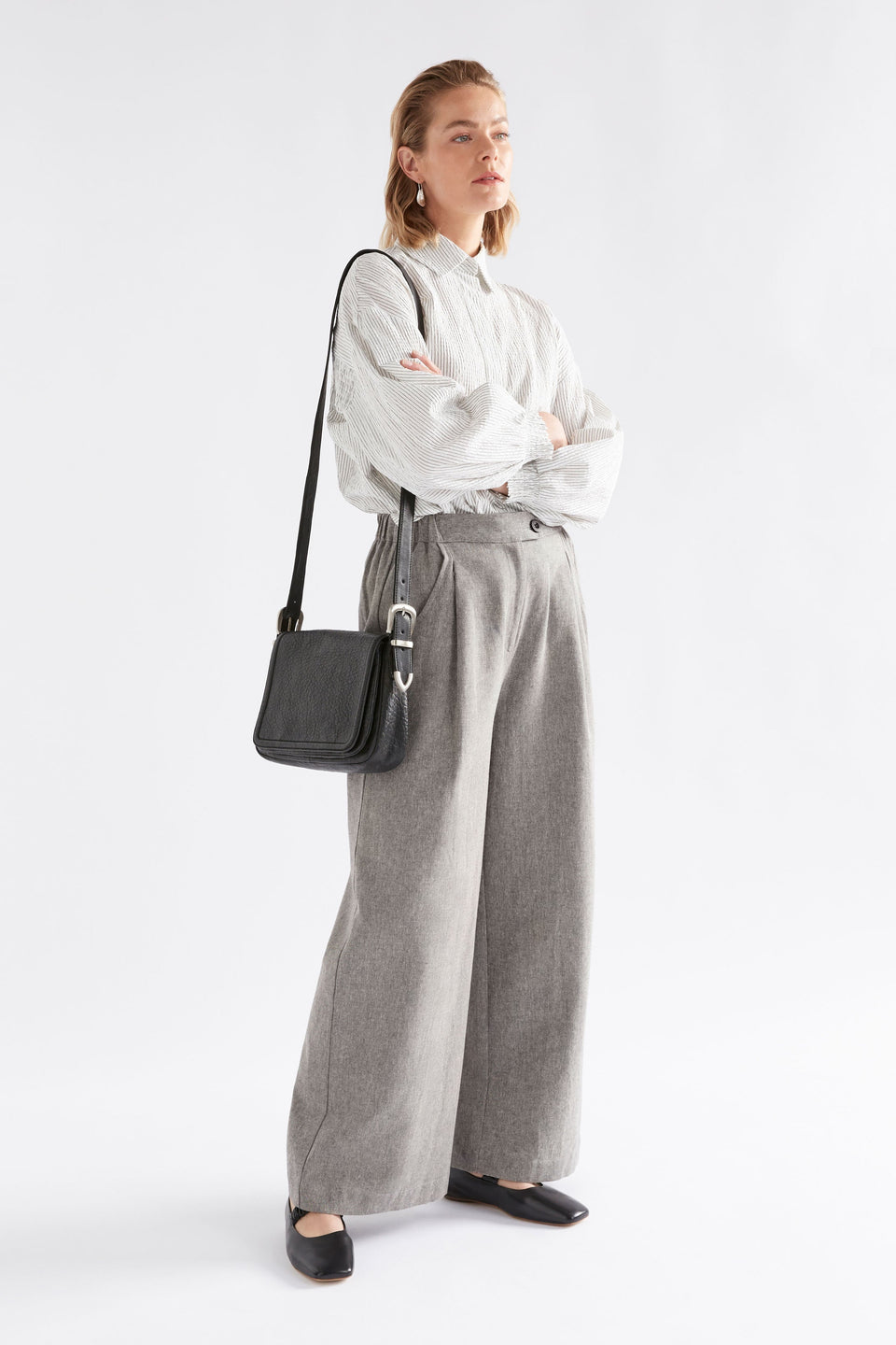 Citte Pant on Model styled with bag | GRAPHITE