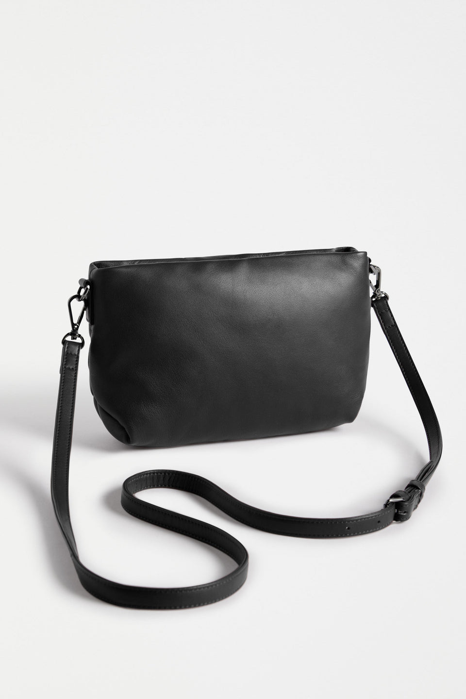Moln Clutch Bag Flat Lay with strap detail | BLACK