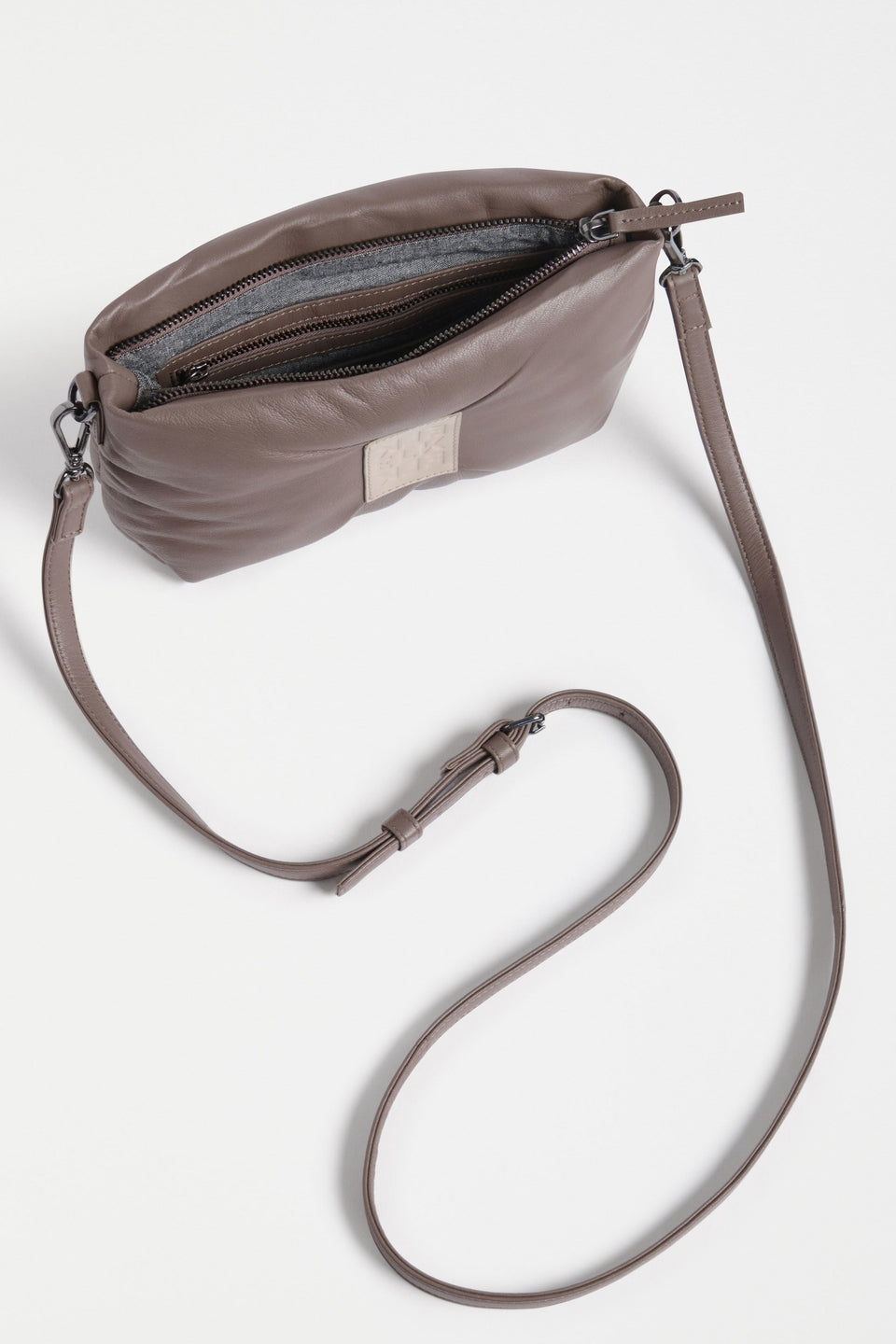 Moln Clutch Bag Flat Lay inside pocket detail and strap | DARK TAUPE