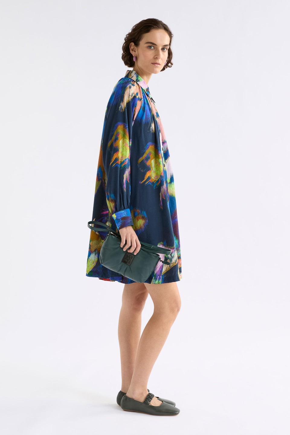 Moln Clutch Bag styled on model with dress | JASPER