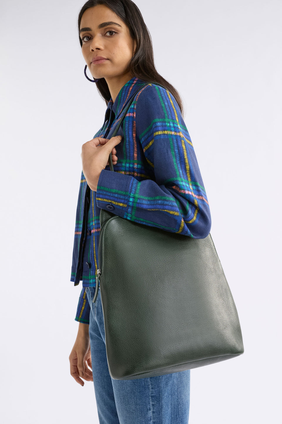 Forde Soft Cow Leather Backpack on model | FOREST GREEN