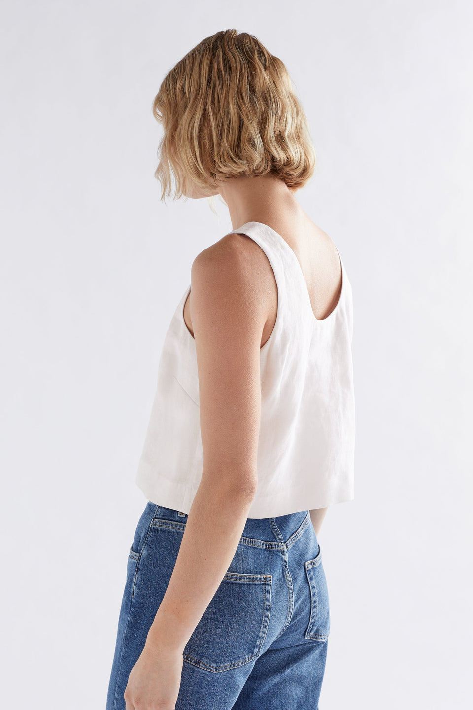 Strom Cropped Linen Tank Model Angled Back | WHITE