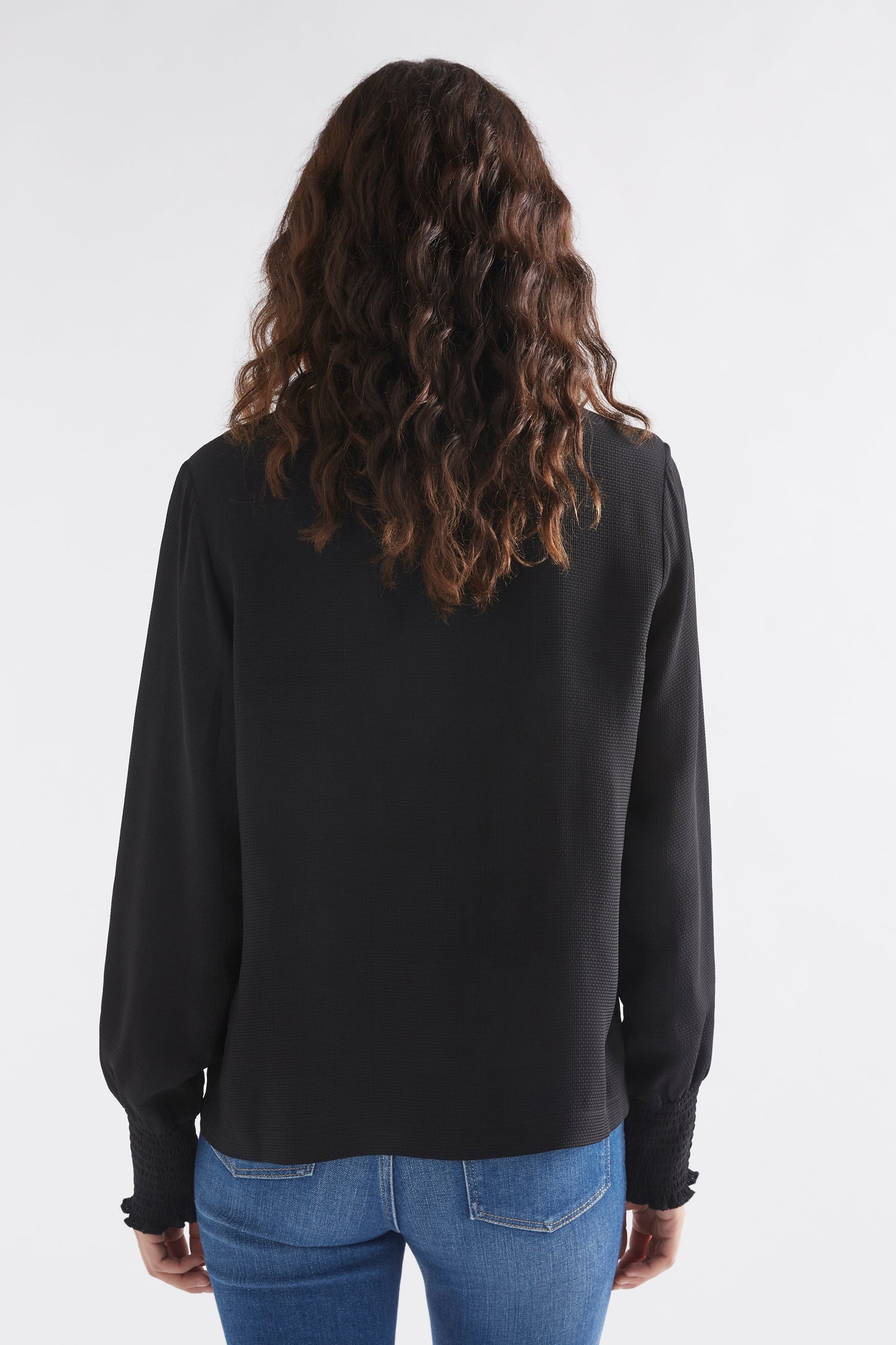 Veda Round Neck Shirred Cuff Long Sleeve Top Model Back | BLACK
