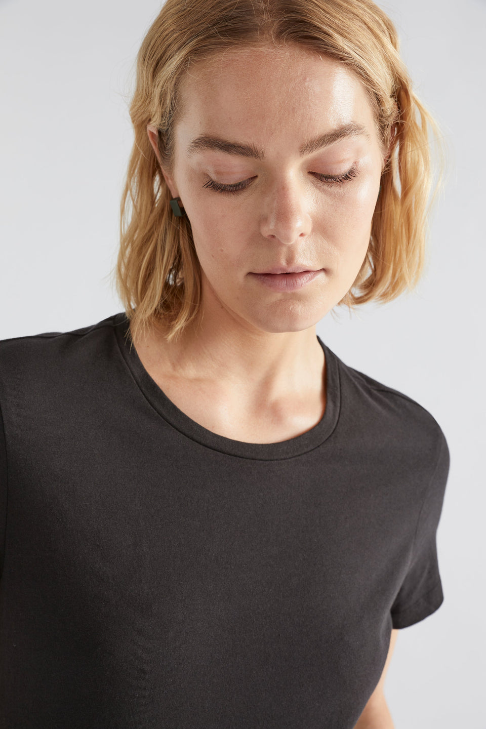 Henning Organic Cotton Tee Model Front Jess Detail | BLACK