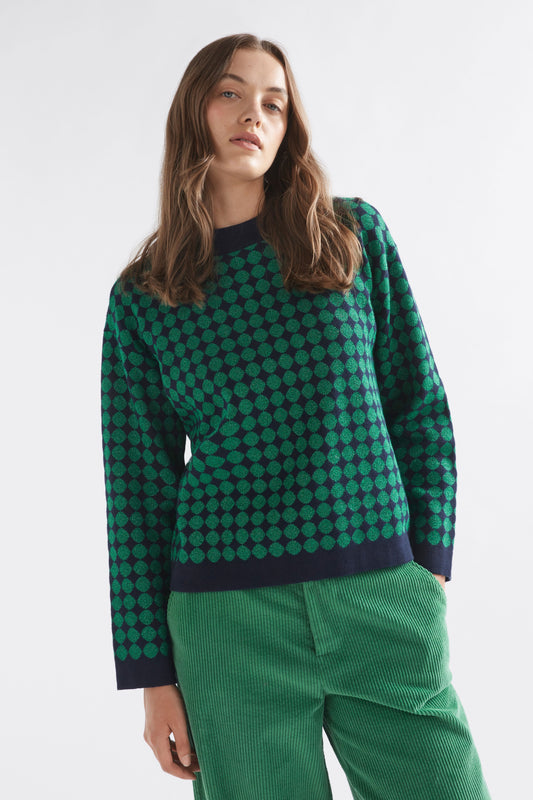Leira Mock Turtle Neck Dropped Sleeve Metallic Circle Knit Sweater Model Front | NAVY GREEN METALLIC
